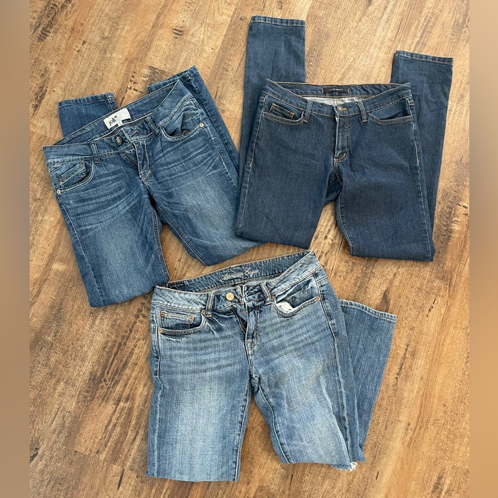 Set of 3 jeans. Light, medium, and dark wash. Size 28/7. $15